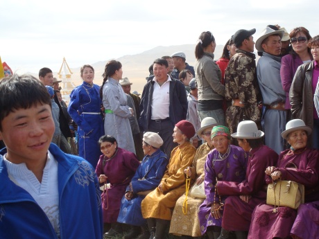 some women in traditional clothing at a local stupa complex opening ceremony outside of Arvaikheer